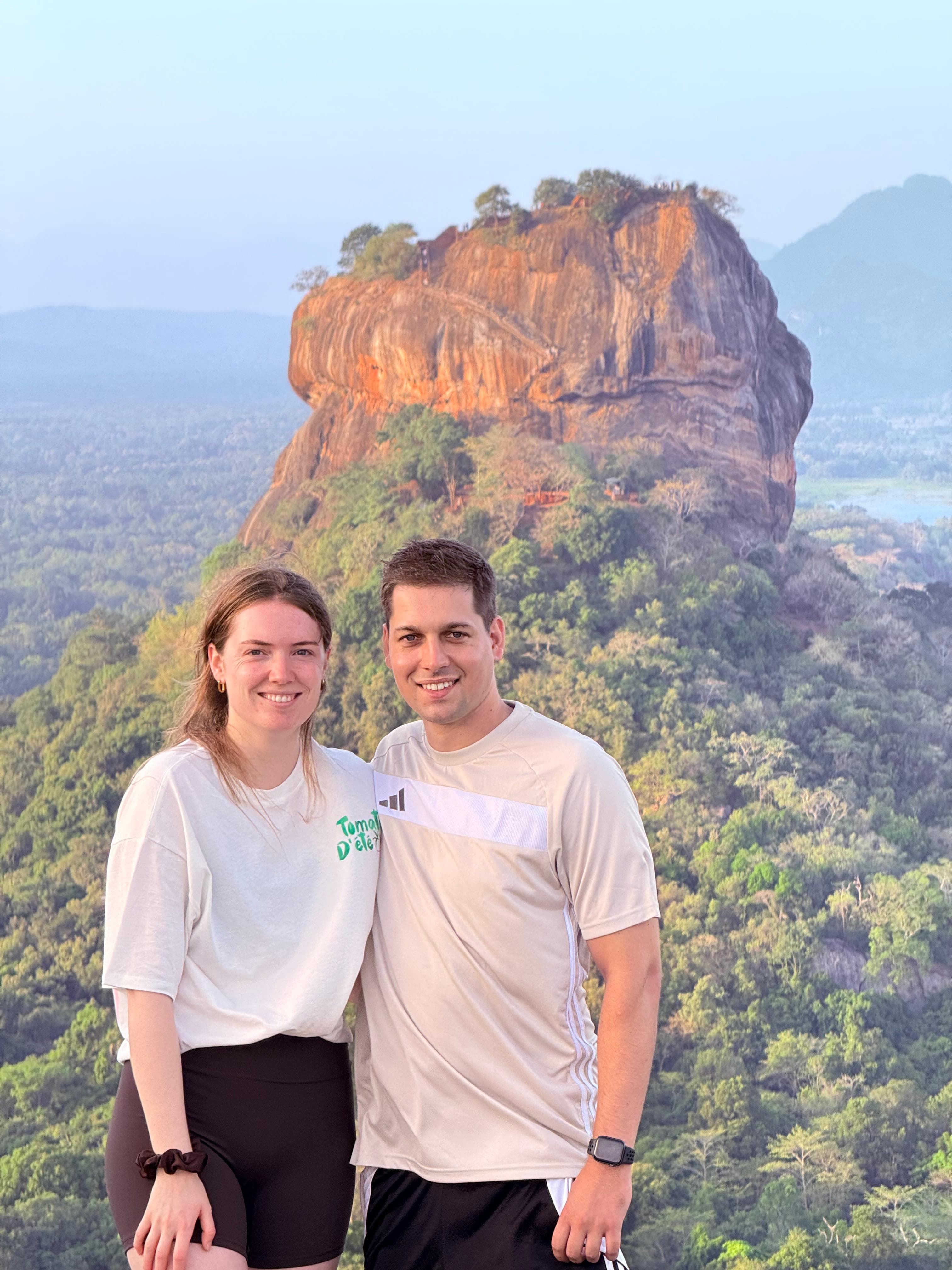 Couple climbing the Sigiriya rock fortress