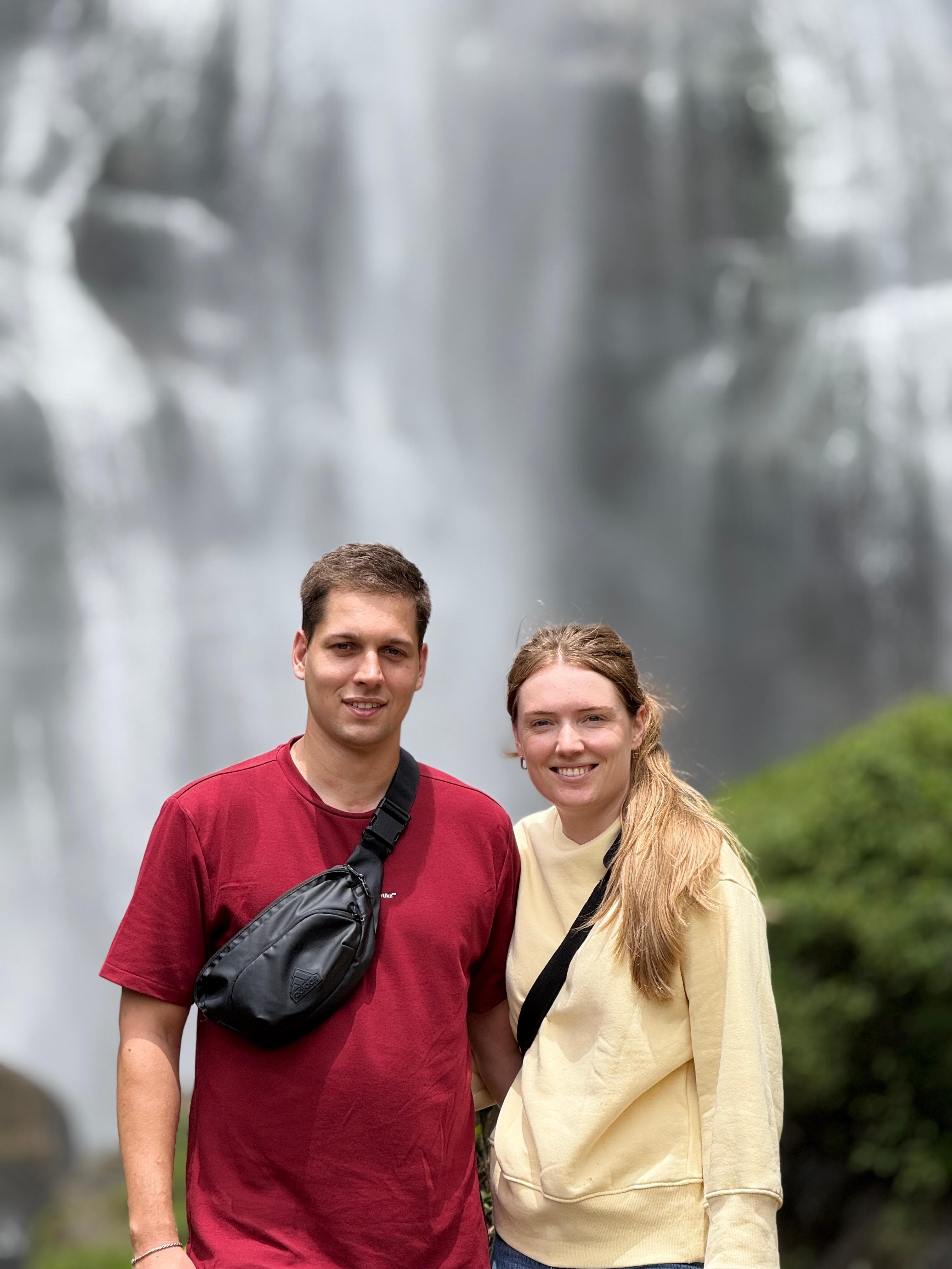 Couple portrait at a waterfall